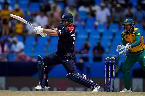 Corey Anderson plays a shot against South Africa